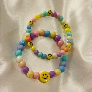 2 Happy Face pastel bracelets 🙂